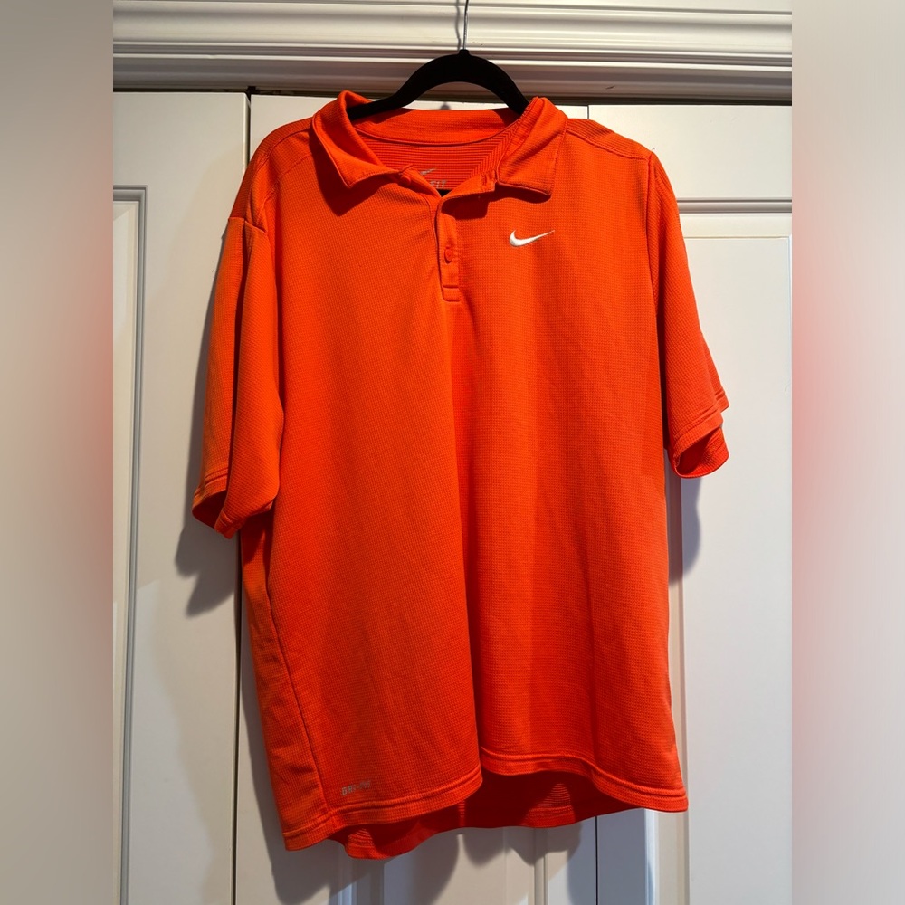Orange Nike golf polo